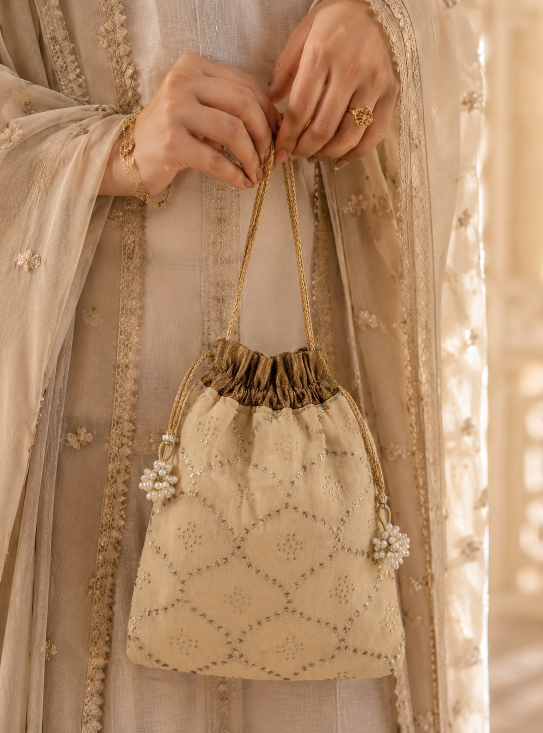 Pure Georgette Mukaish work Potli - Image 1