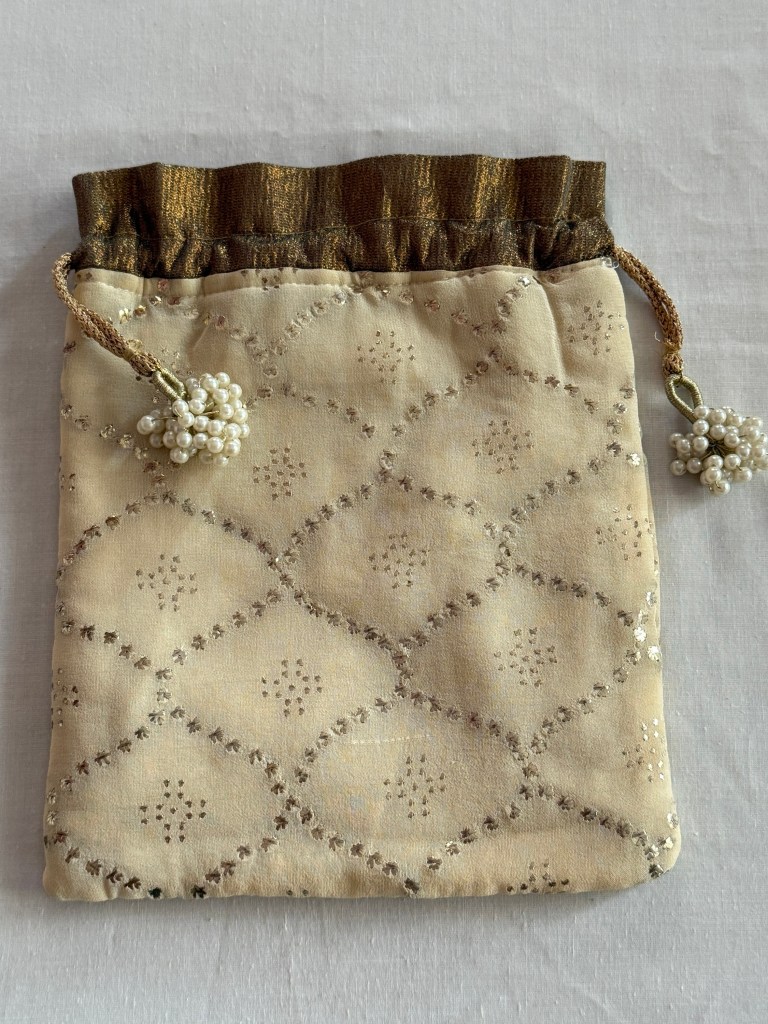 Pure Georgette Mukaish work Potli