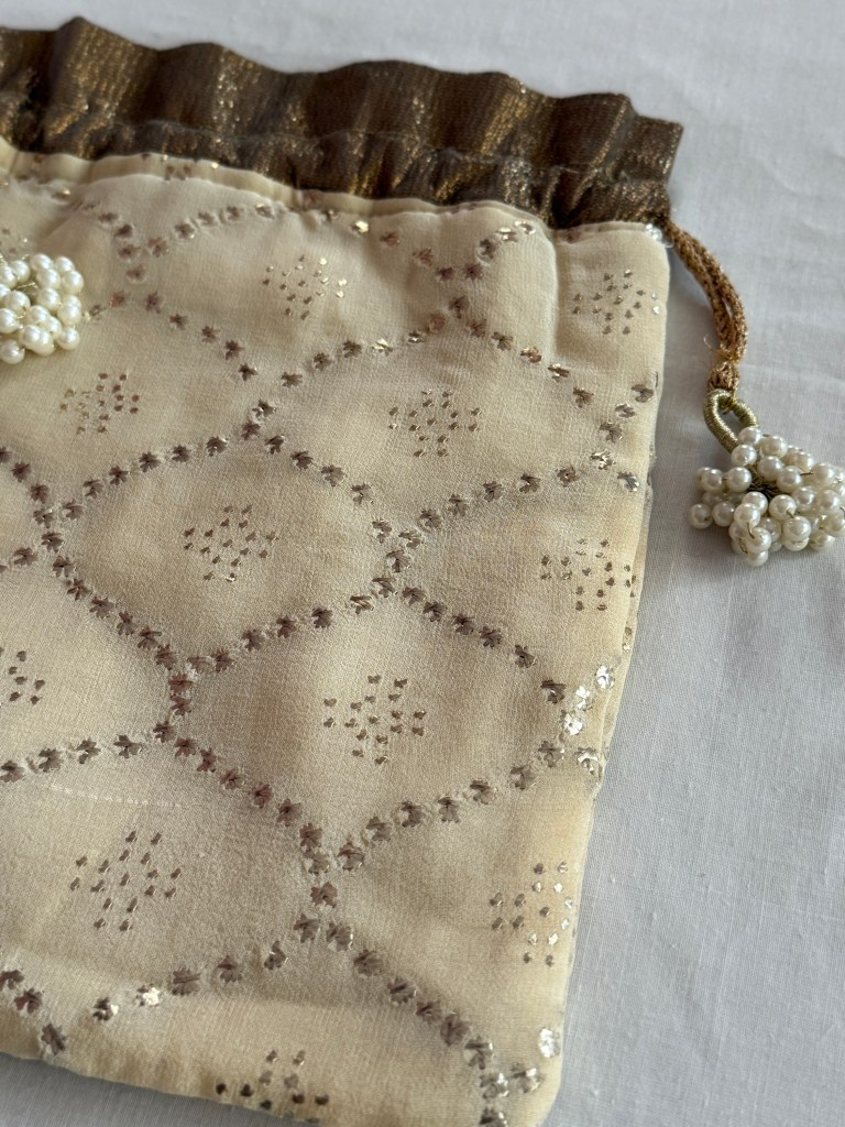 Pure Georgette Mukaish work Potli