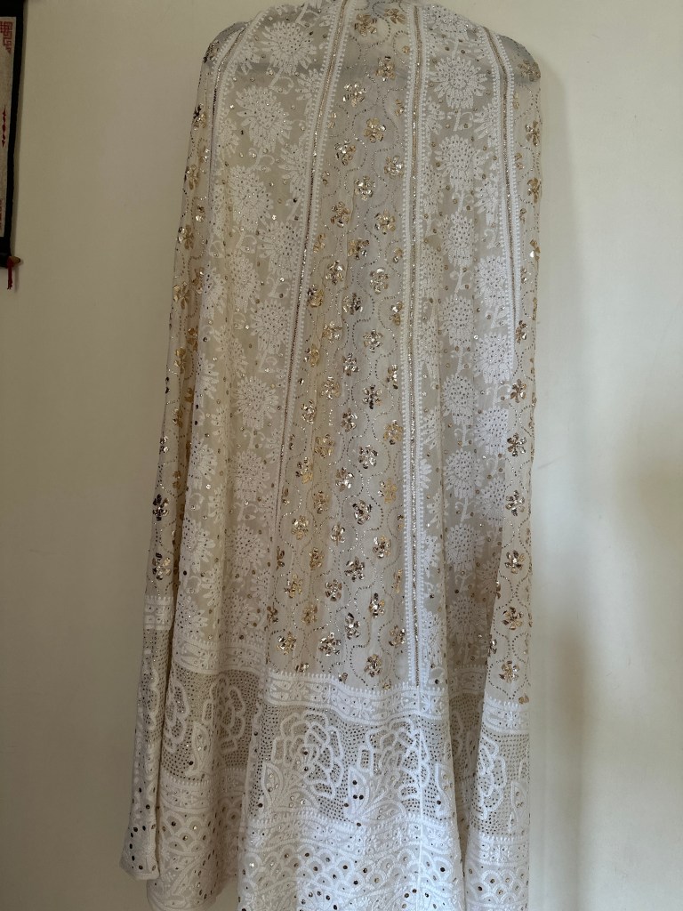 off-white pure georgette chikankari lehenga with kamdani work