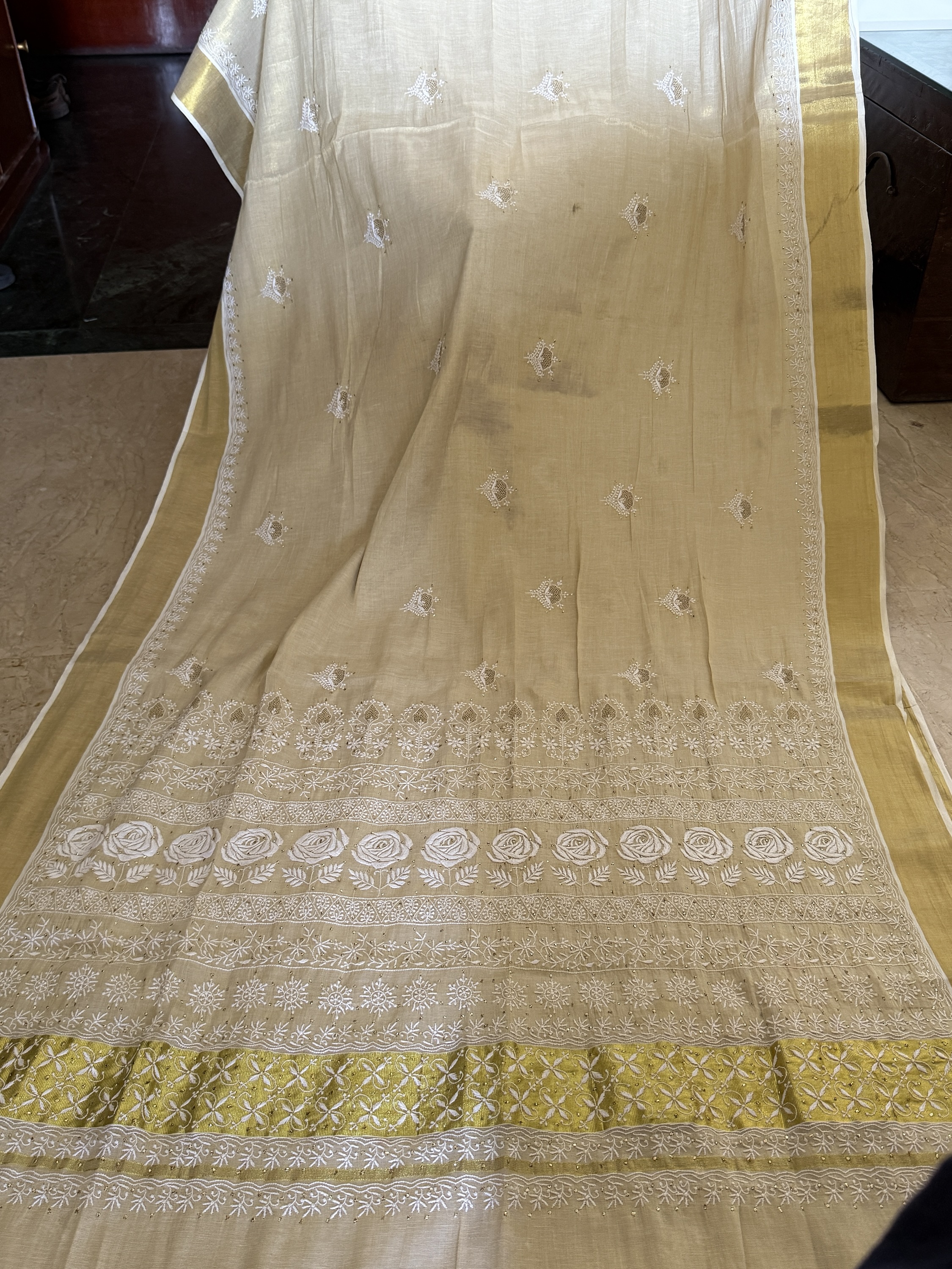Off-white Kerala Kasavu saree with Chikankari & Jaali work motifs. - Image 1