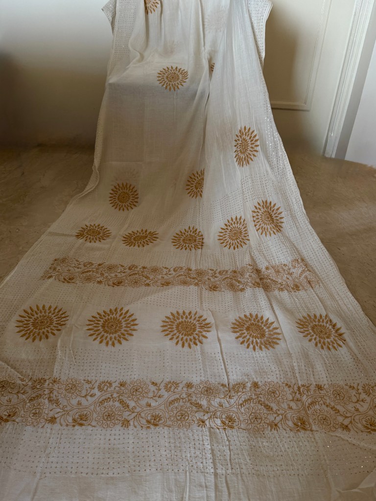 Off-white pure mulmul chikankari & mukaish work saree with blouse