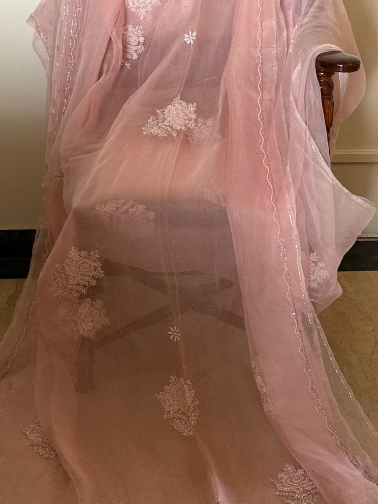 Blush peach pure organza chikankari saree with pearl work