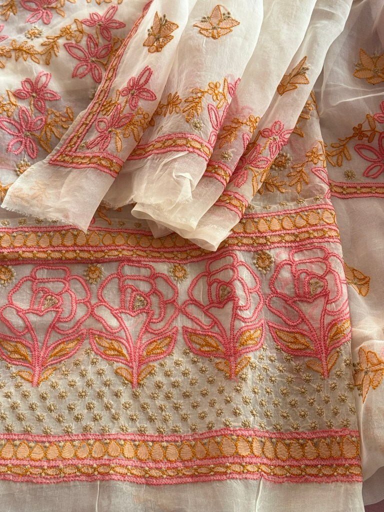 Off-white pure organza chikankari kurta dupatta set with peach & pink shadow & murri work