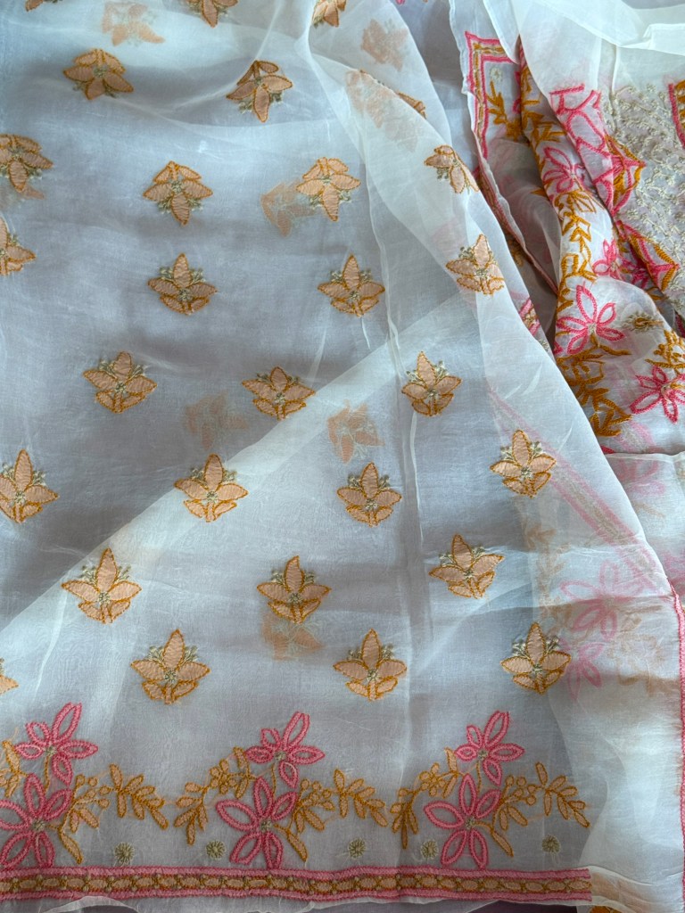 Off-white pure organza chikankari kurta dupatta set with peach & pink shadow & murri work