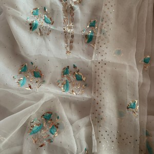 Off-white pure organza kurta dupatta set with hand crafted gara work, mukaish work and Pitta work