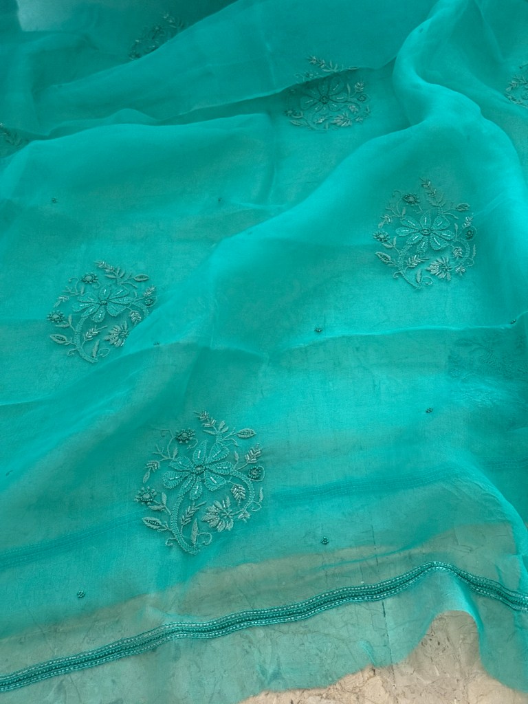Caribbean blue pure organza chikankari saree with bead work
