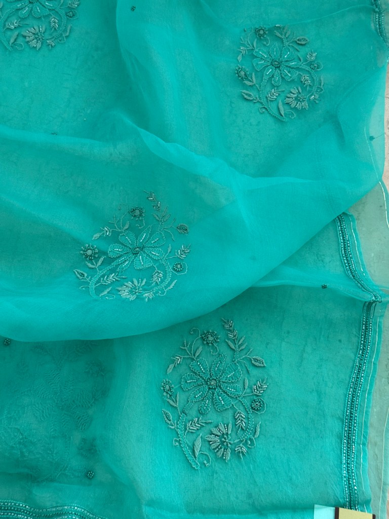 Caribbean blue pure organza chikankari saree with bead work