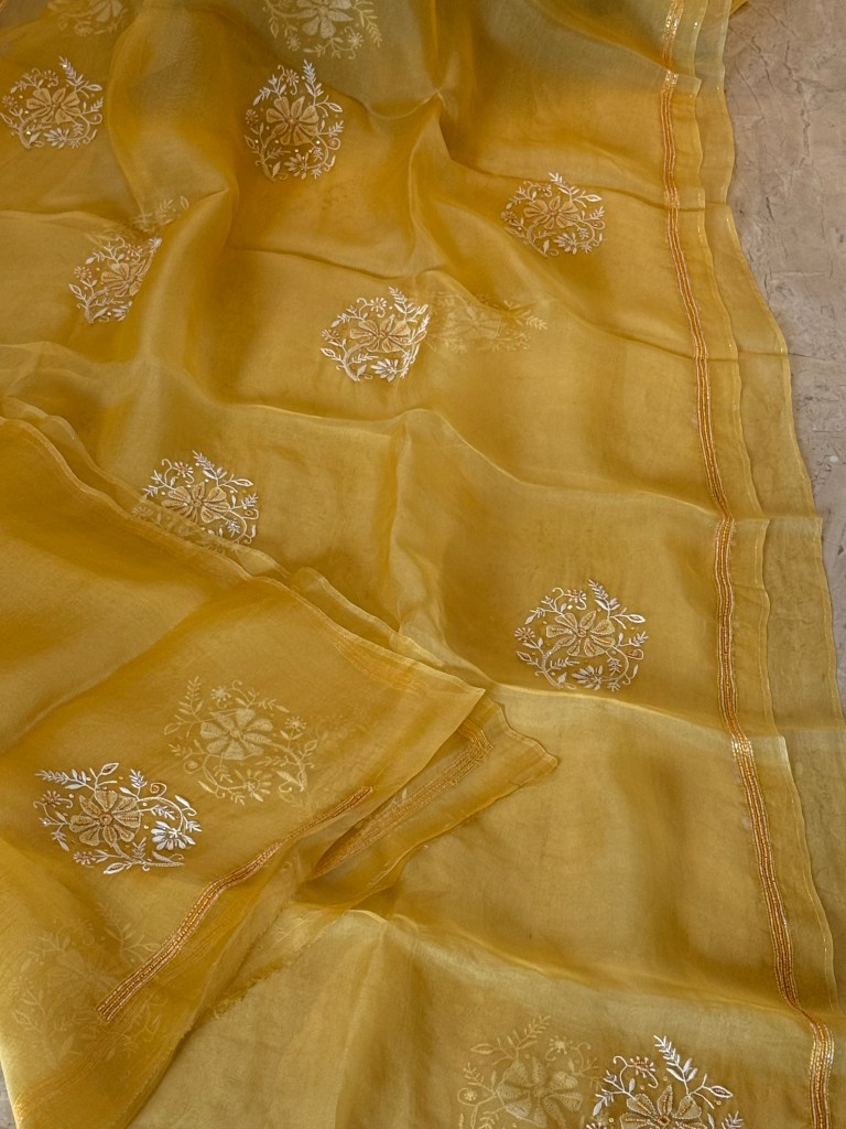 Golden yolk pure organza chikankari saree with pearl & bead work