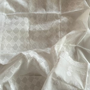 Classic white pure cotton Chikankari kurta piece with delicate hand cut daraz work