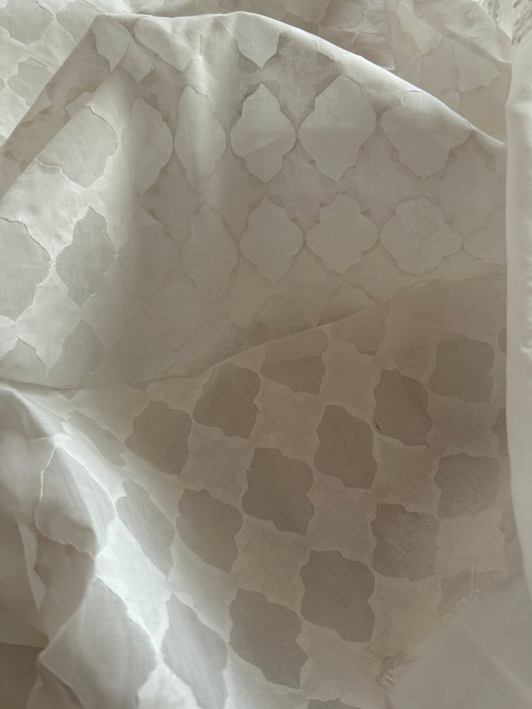 Classic white pure cotton Chikankari kurta piece with delicate hand cut daraz work