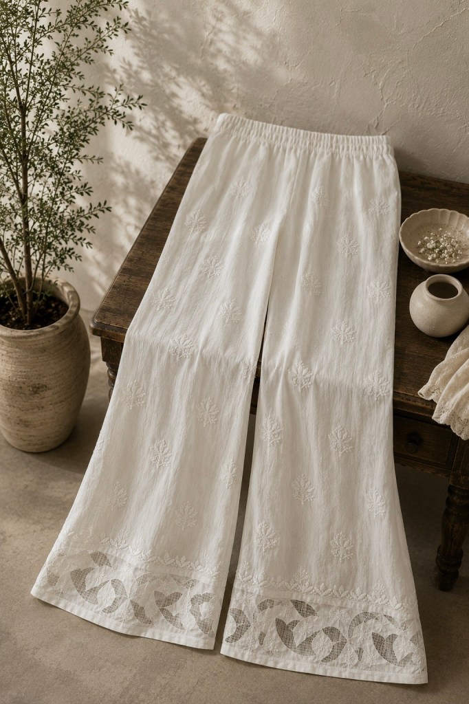 Breezy summer essential white pure cotton pants with applique detailing - free size