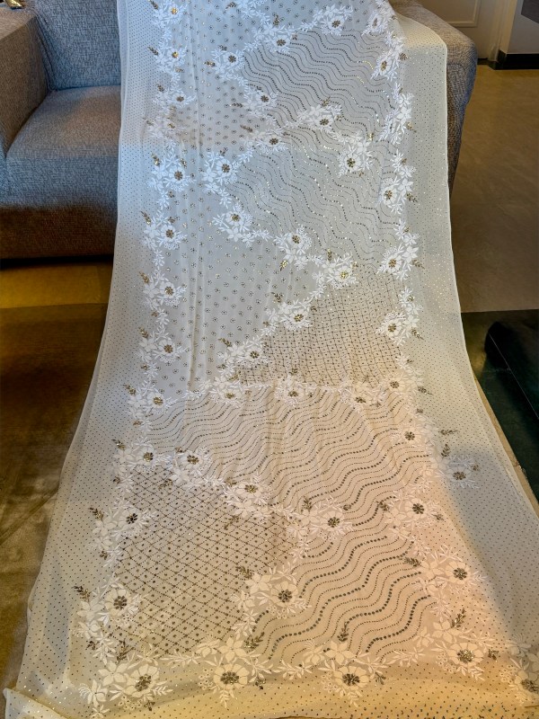 Classic ivory & gold handcrafted mukaish work saree with blouse. A master craftsman piece.