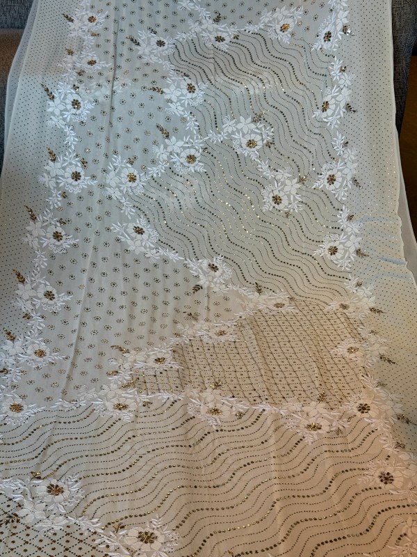 Classic ivory & gold handcrafted mukaish work saree with blouse. A master craftsman piece.