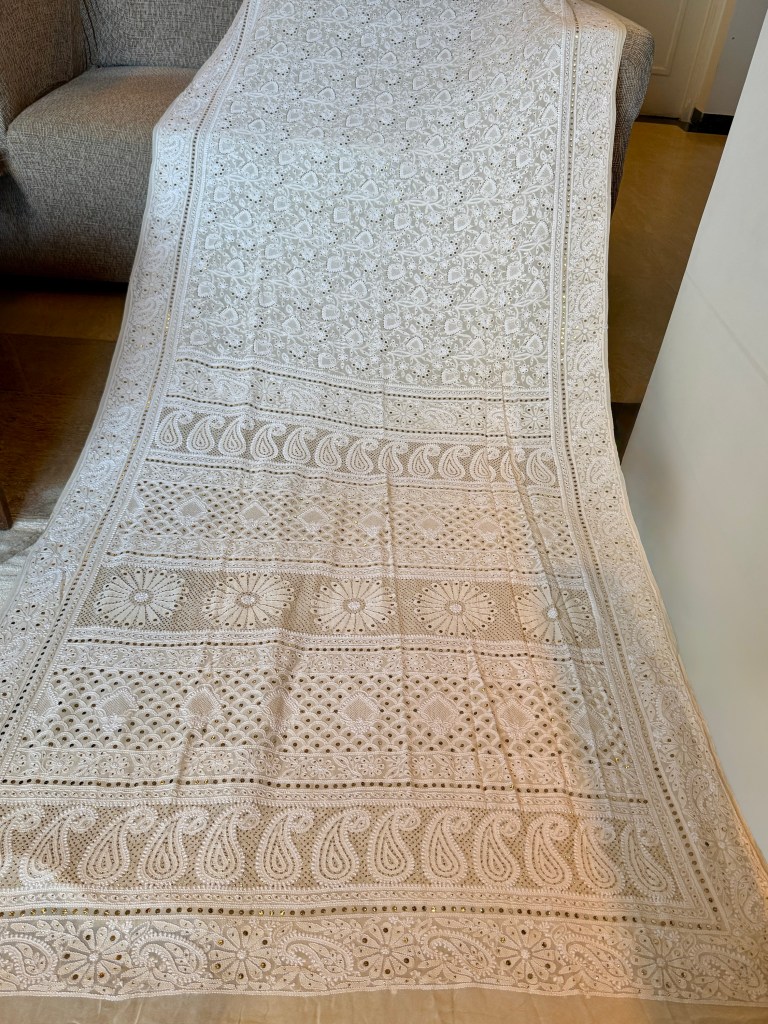 Ivory & gold pure georgette Jaali work jaal Chikankari saree with blouse. A master craftsman piece.